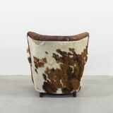 Fauteuil art déco en peau de vache