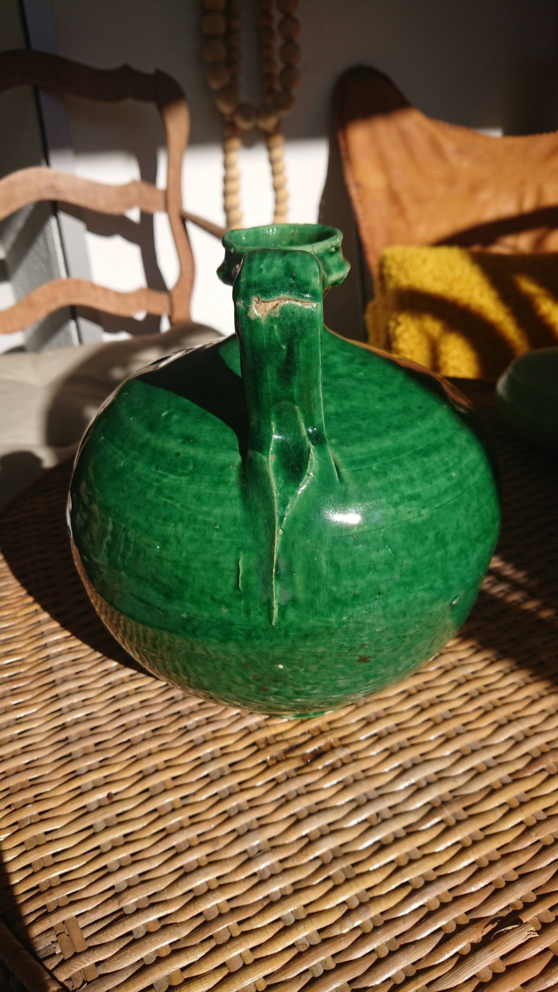 Green enamelled sandstone jug