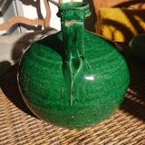 Green enamelled sandstone jug