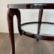 Round mid-century coffee table in walnut with a double top by Paolo Buffa.