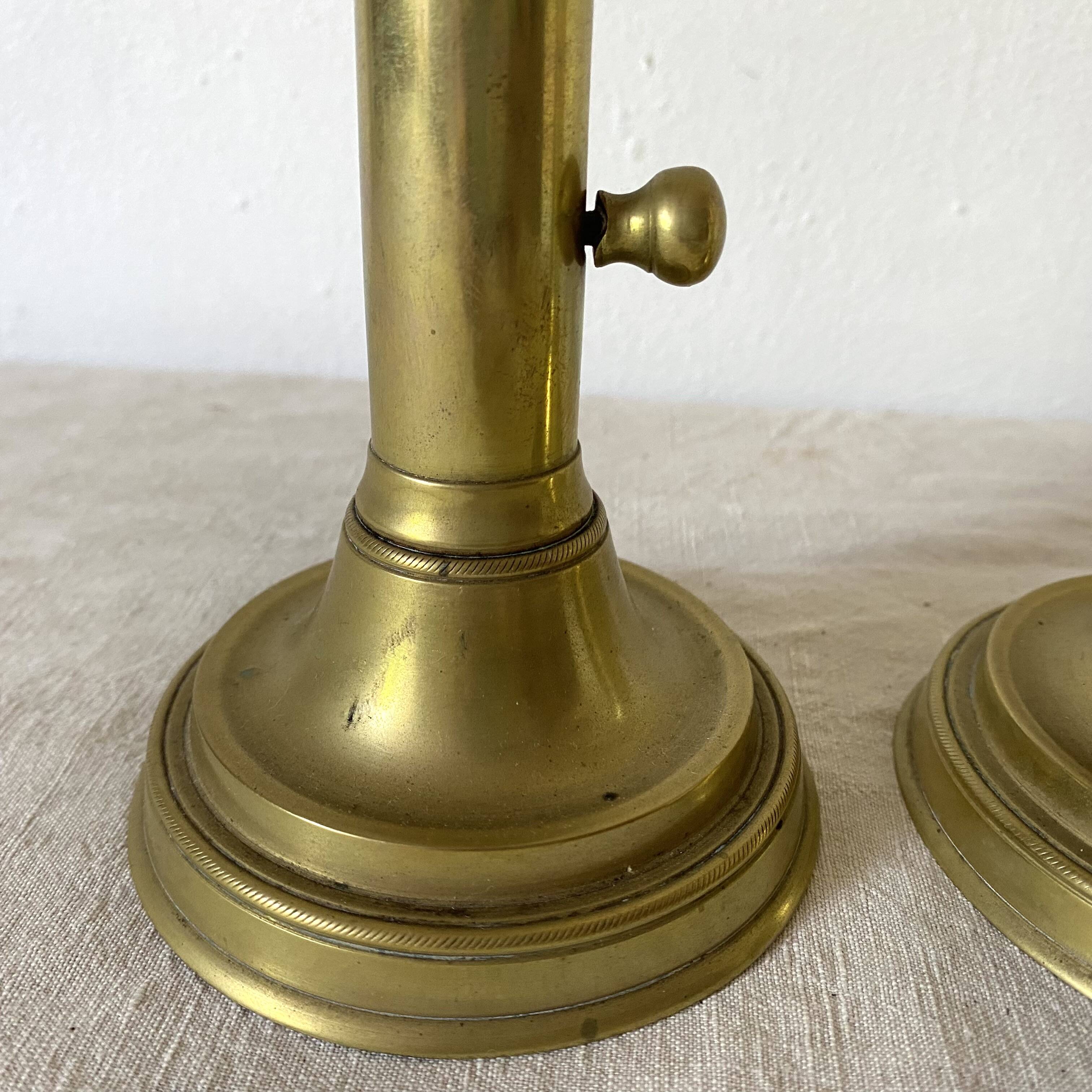 Pair of gilded brass candlesticks
