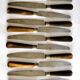 Set of 12 antique table knives from 1900 with horn handles and forged steel blades, Paris, 24.5 cm long.