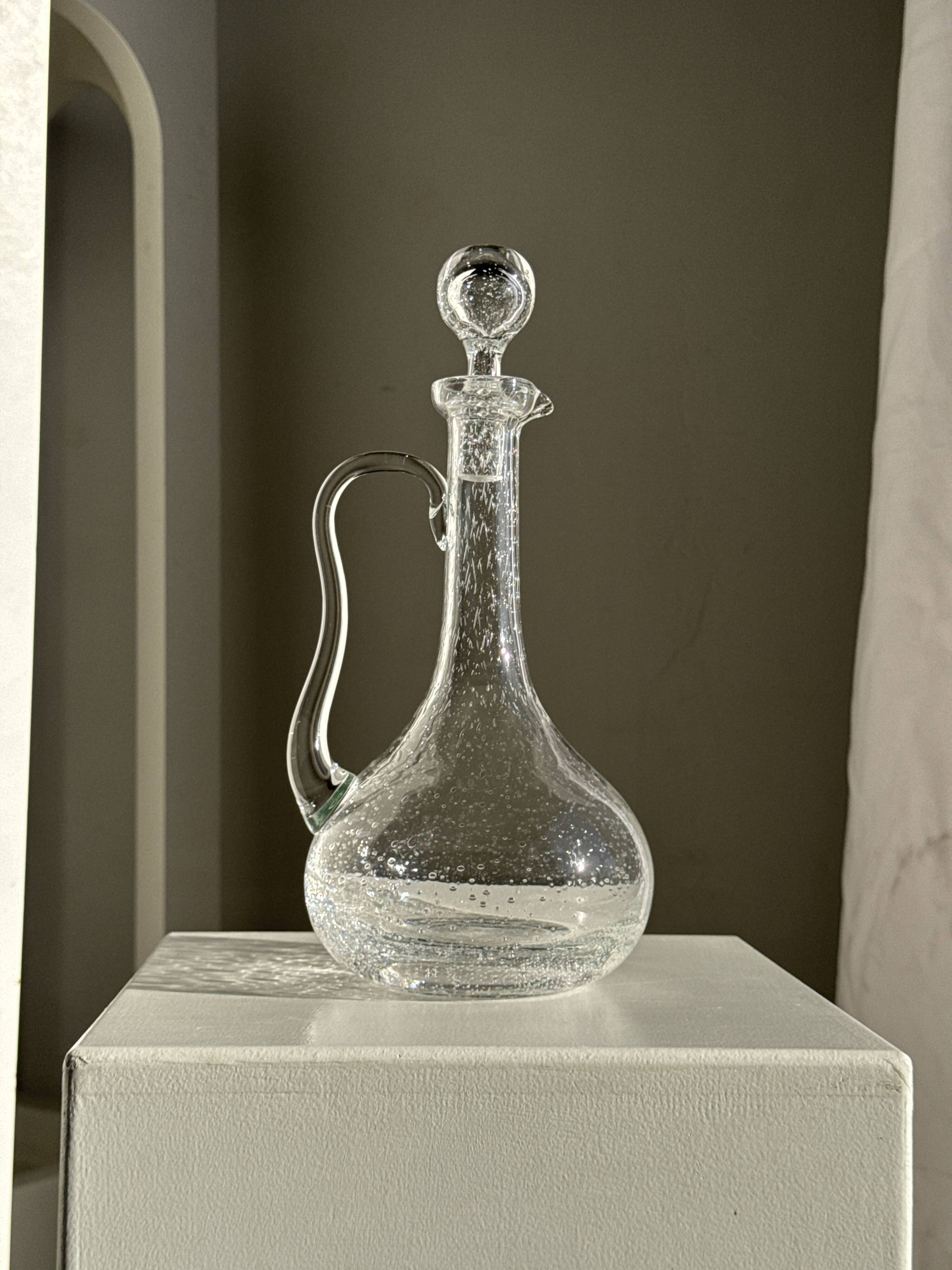 Large transparent glass carafe with a Biot stopper H32 D14.5