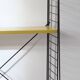 Tomado shelf in coloured metal floor shelves from 1958.