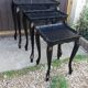 Set of 3 black nesting tables.