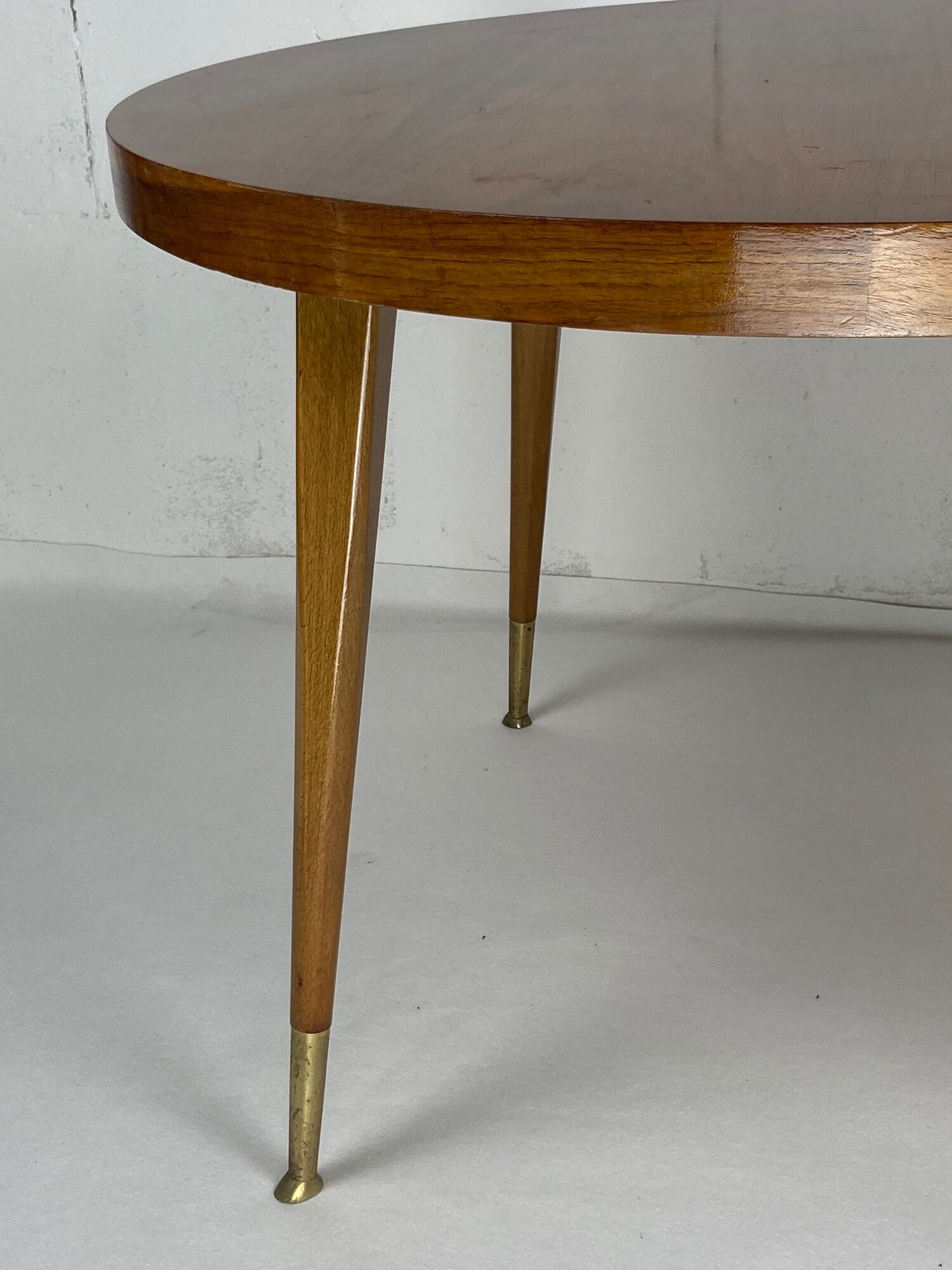 Italian round table with tapered brass leg ends, 1950s