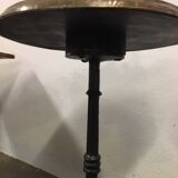 Old foot cast-iron bistro and brass round tray