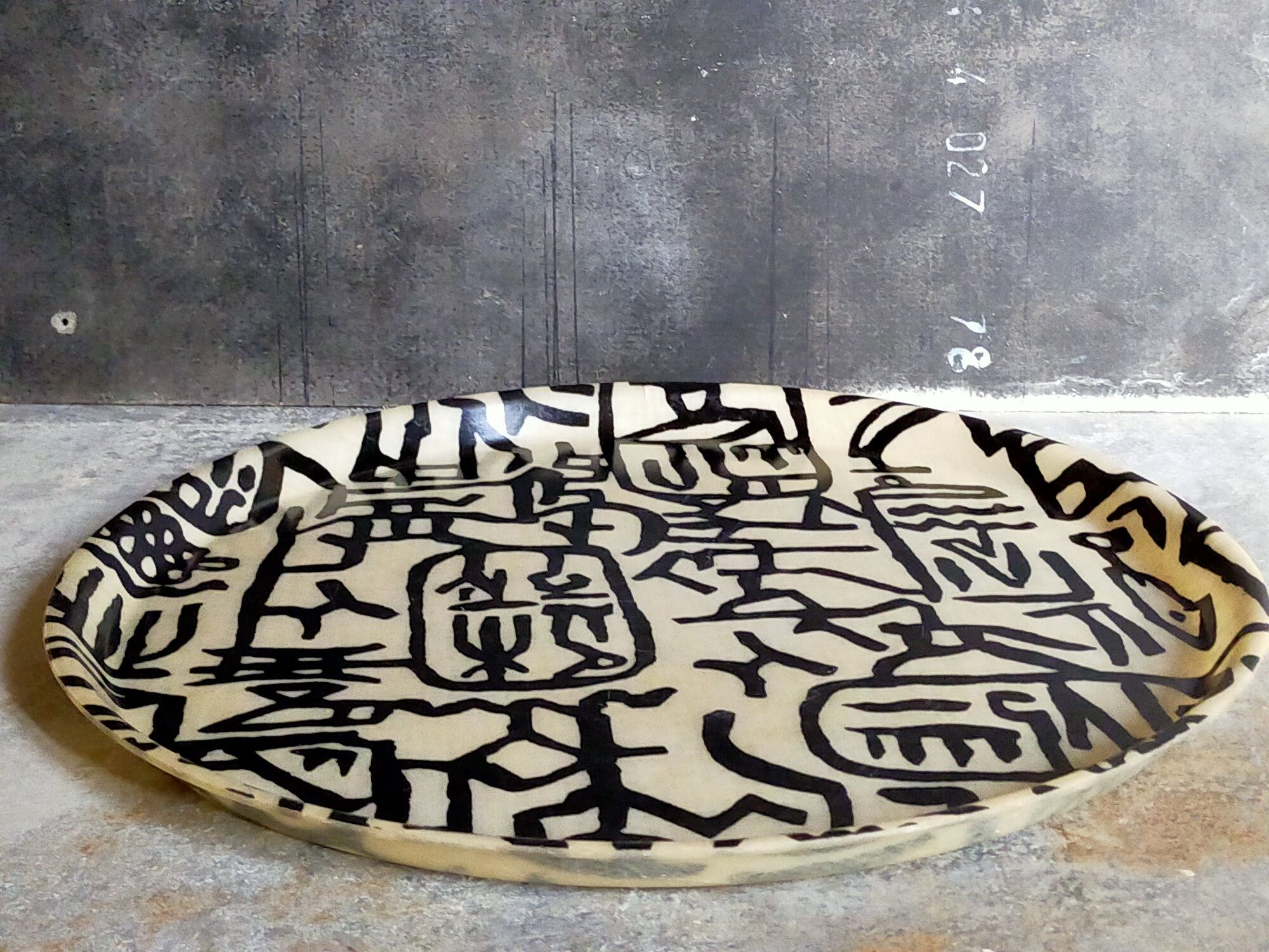 Vintage fiberglass tray with graphic patterns