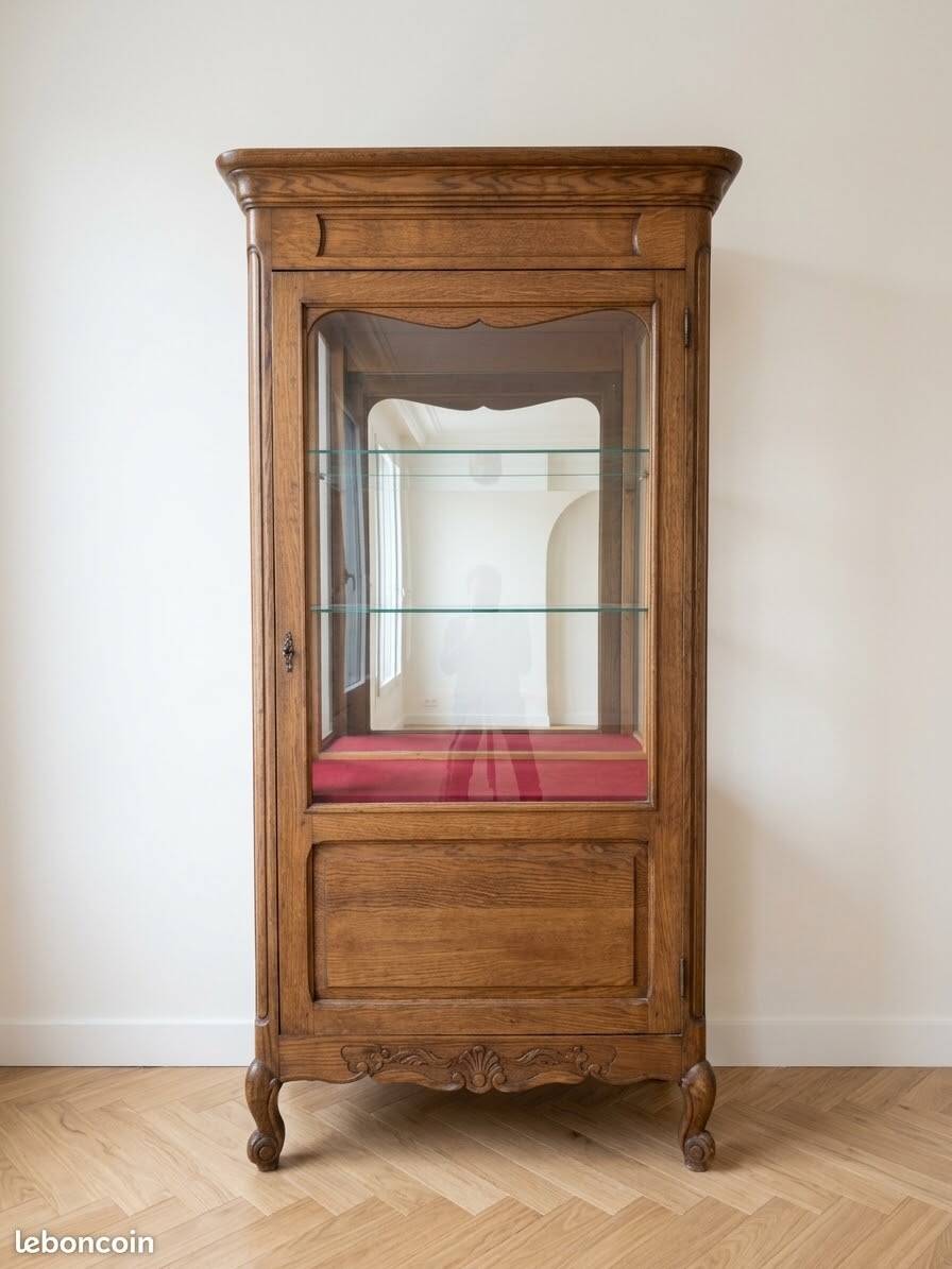 Vintage wooden display cabinet with glass shelves.