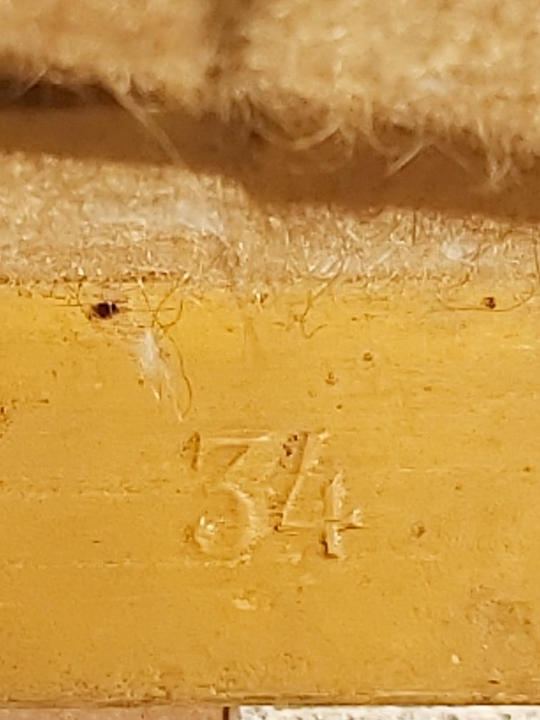 Pair of chairs with a golden lyre