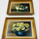 Pair of small framed vintage floral oils
