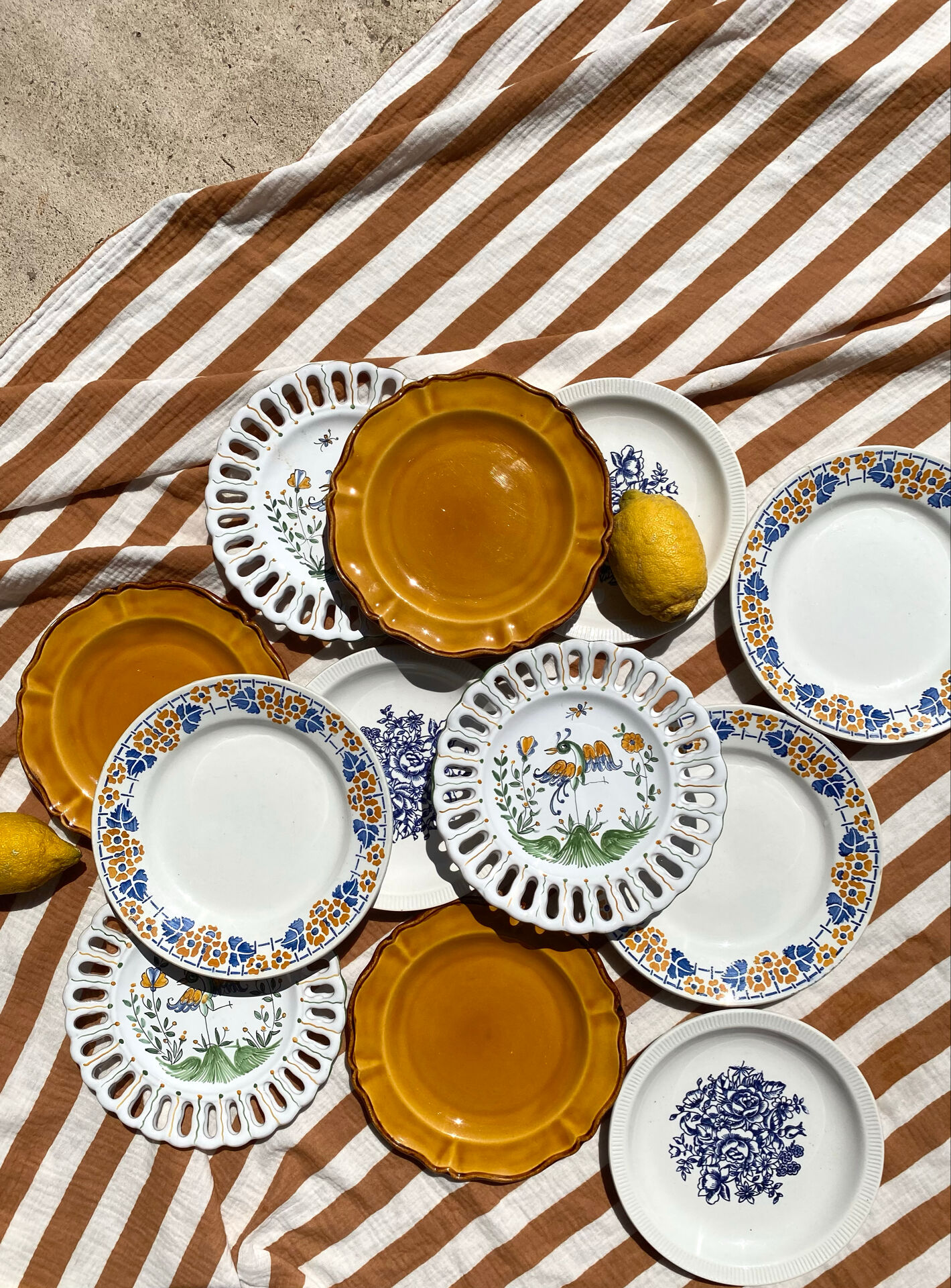 Set of twelve mismatched vintage dessert plates.