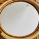 Vintage 60s/70s rattan sun mirror.