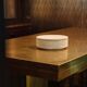 Cylindrical bowl in travertine with lid