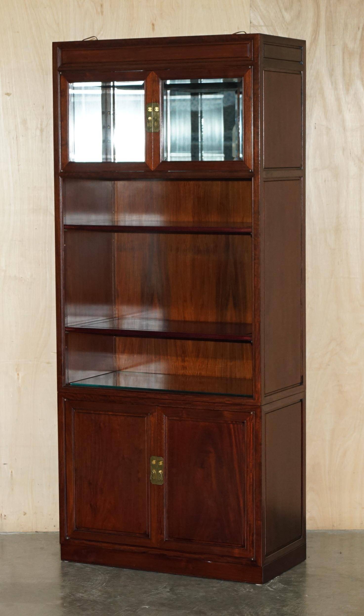 Set of three vintage hardwood military-style bookshelves.