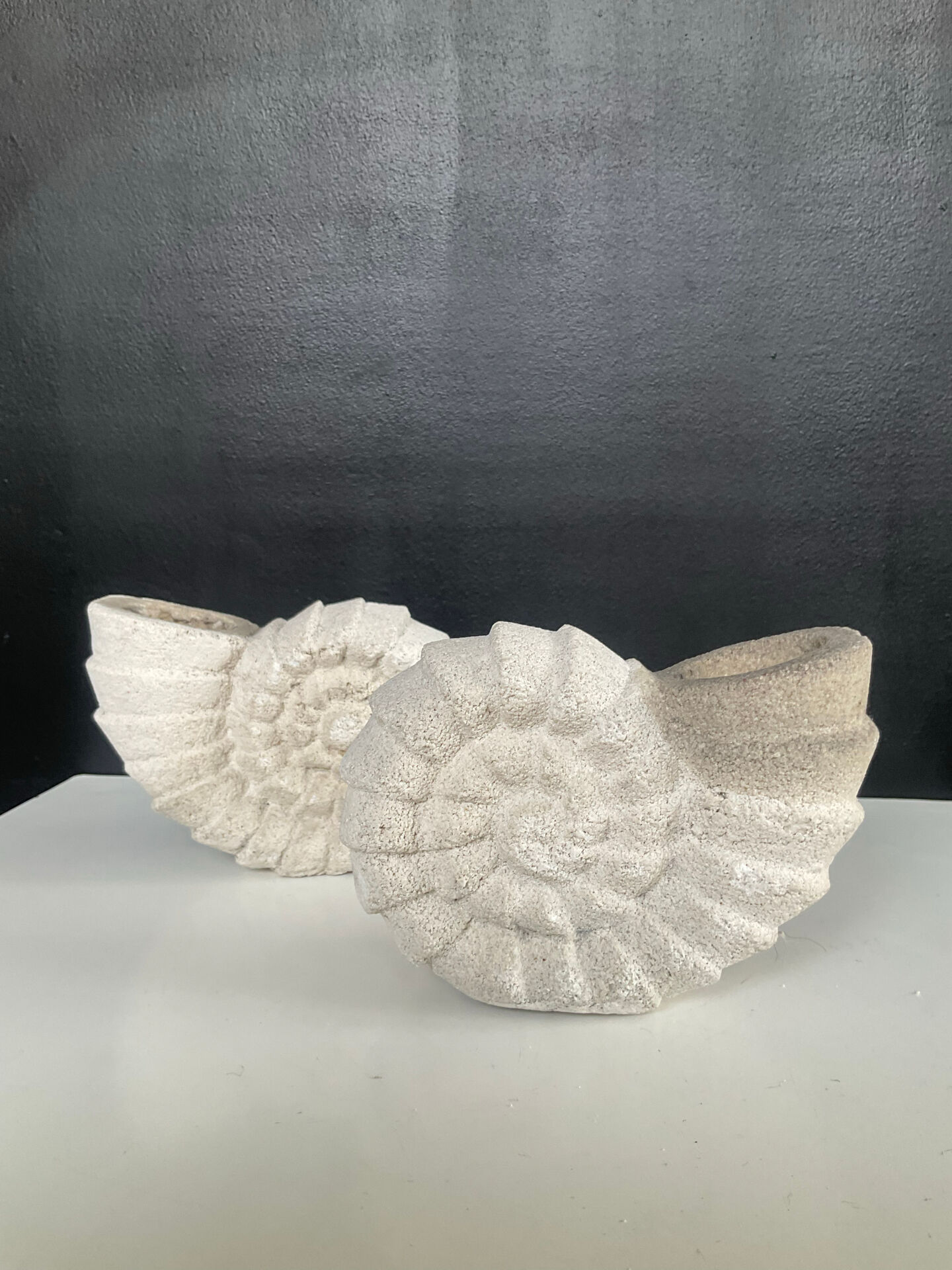 Vintage stone shell candlestick pair