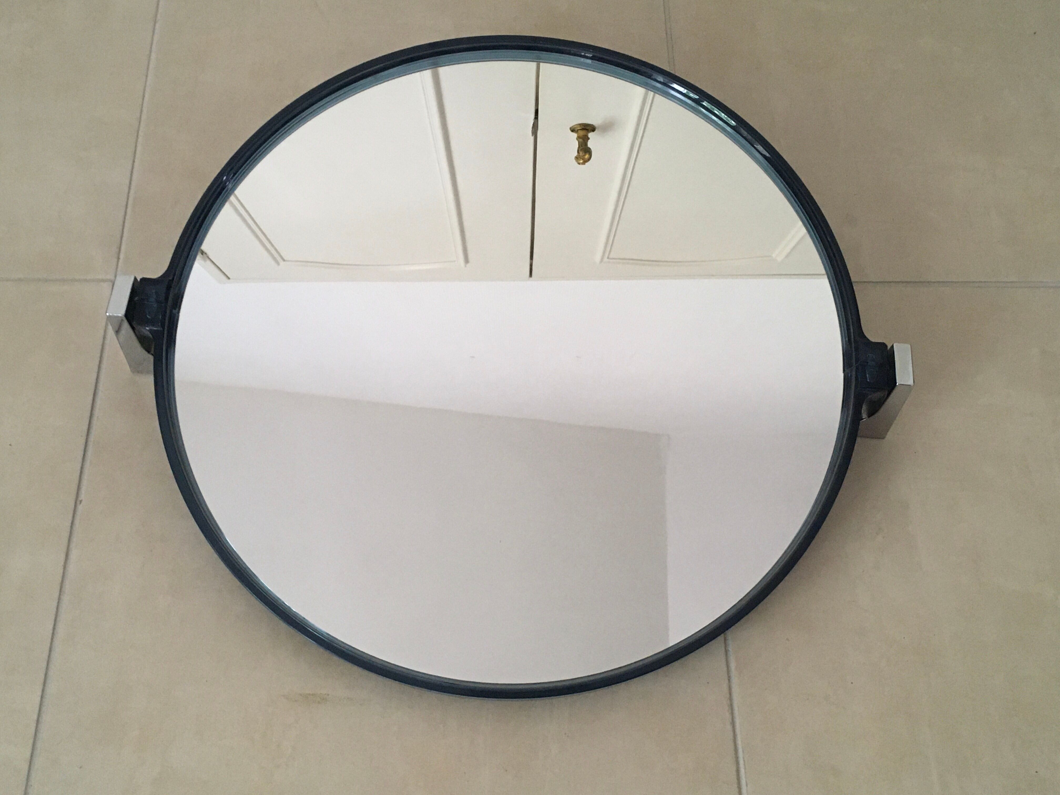 Swivel vintage mirror.
