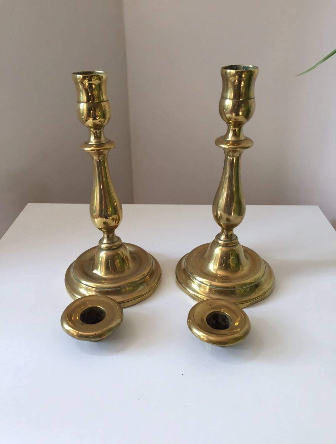 Pair of antique gilt brass candlesticks