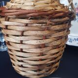 Small bottle style dame Jeanne and its wicker