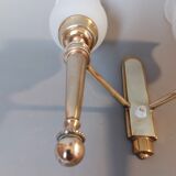 Neoclassical Torch two-arm wall lamp in solid brass, circa 1940