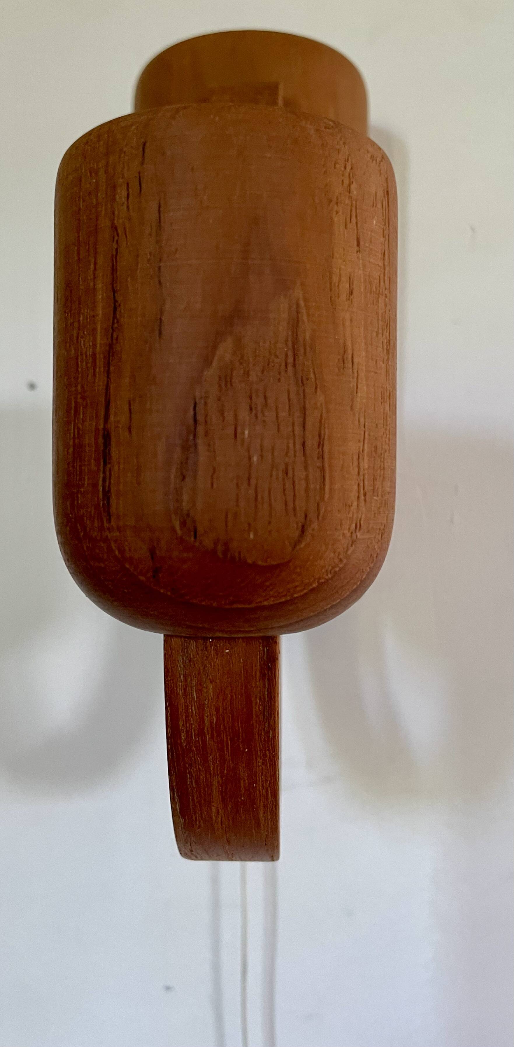 Pair of Scandinavian teak wall lights, Dolmus, 70s