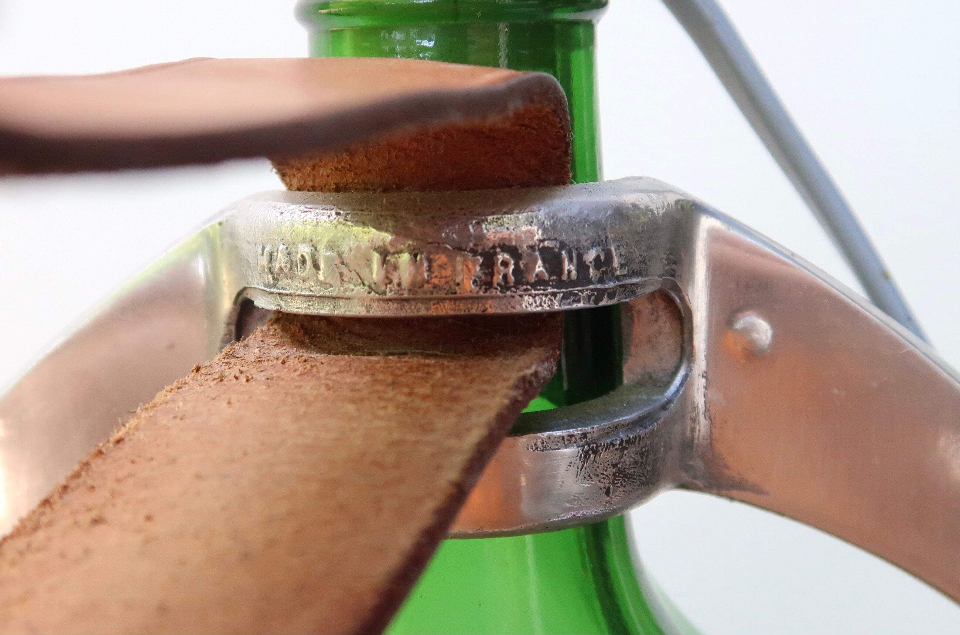 Armagnac Ducastaing bottle lamp and its stirrup, 60s