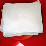 12 Damask napkins with lettering.