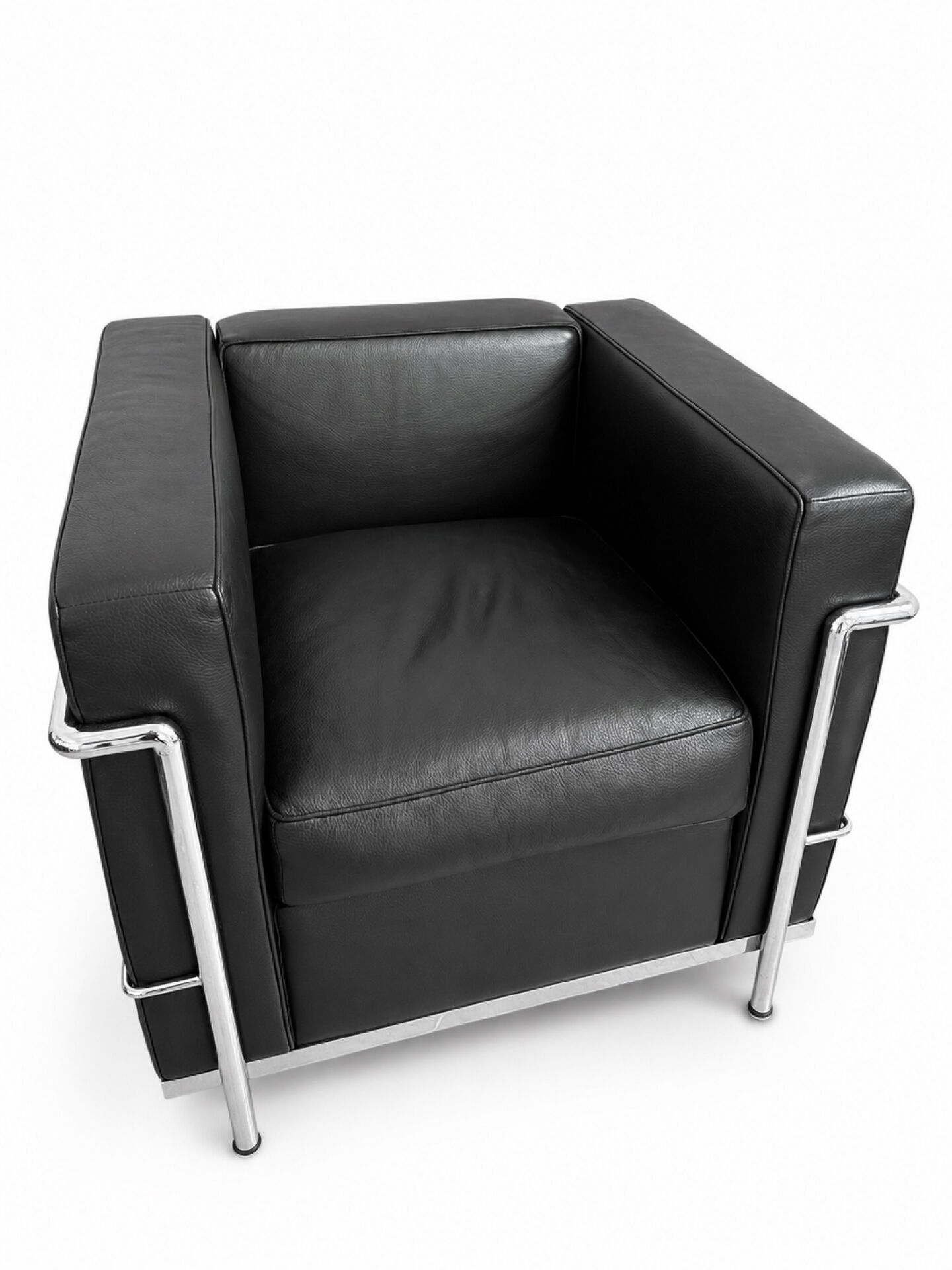 Paire de fauteuils en cuir