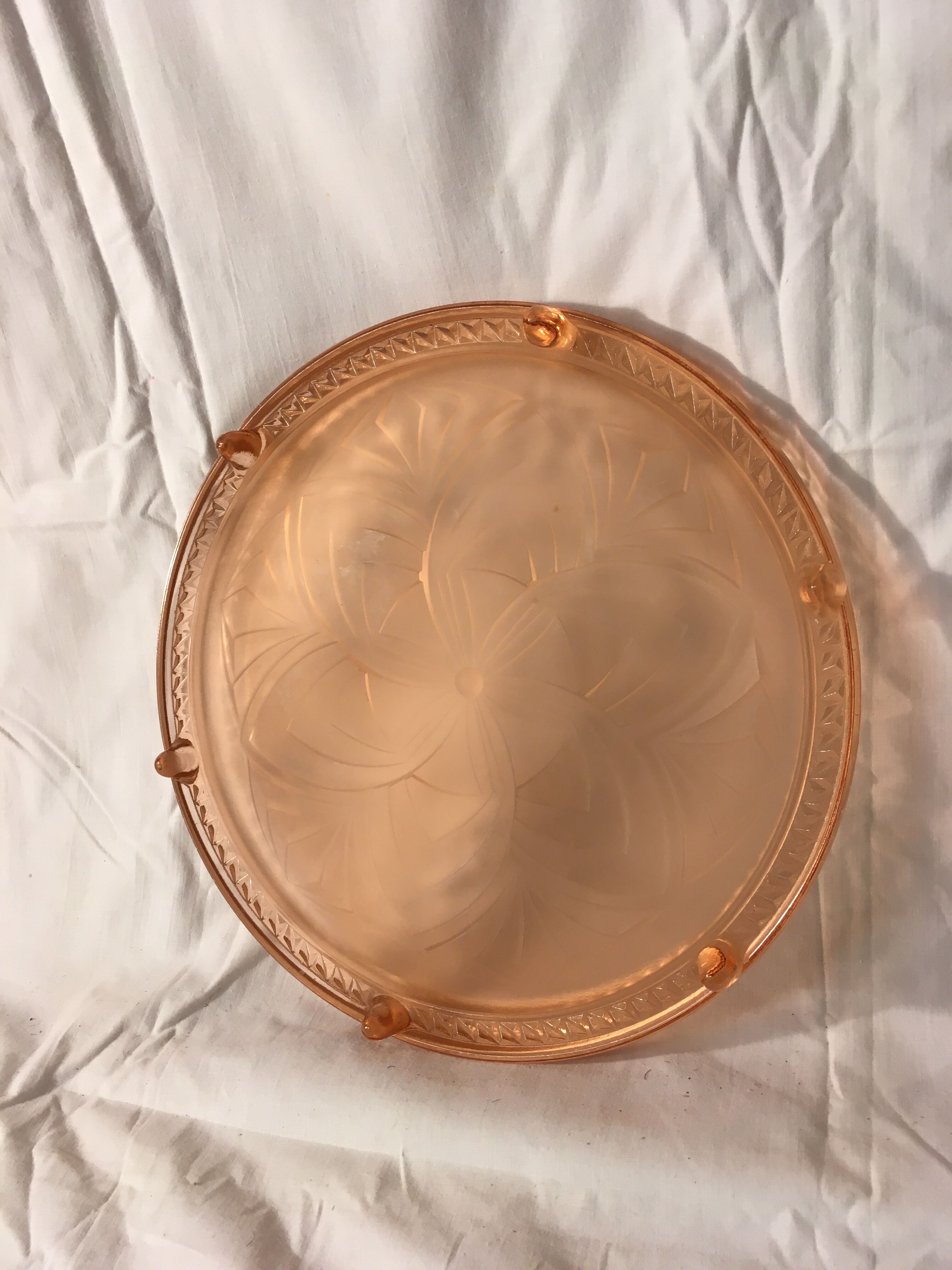 Pink moulded glass dish underside