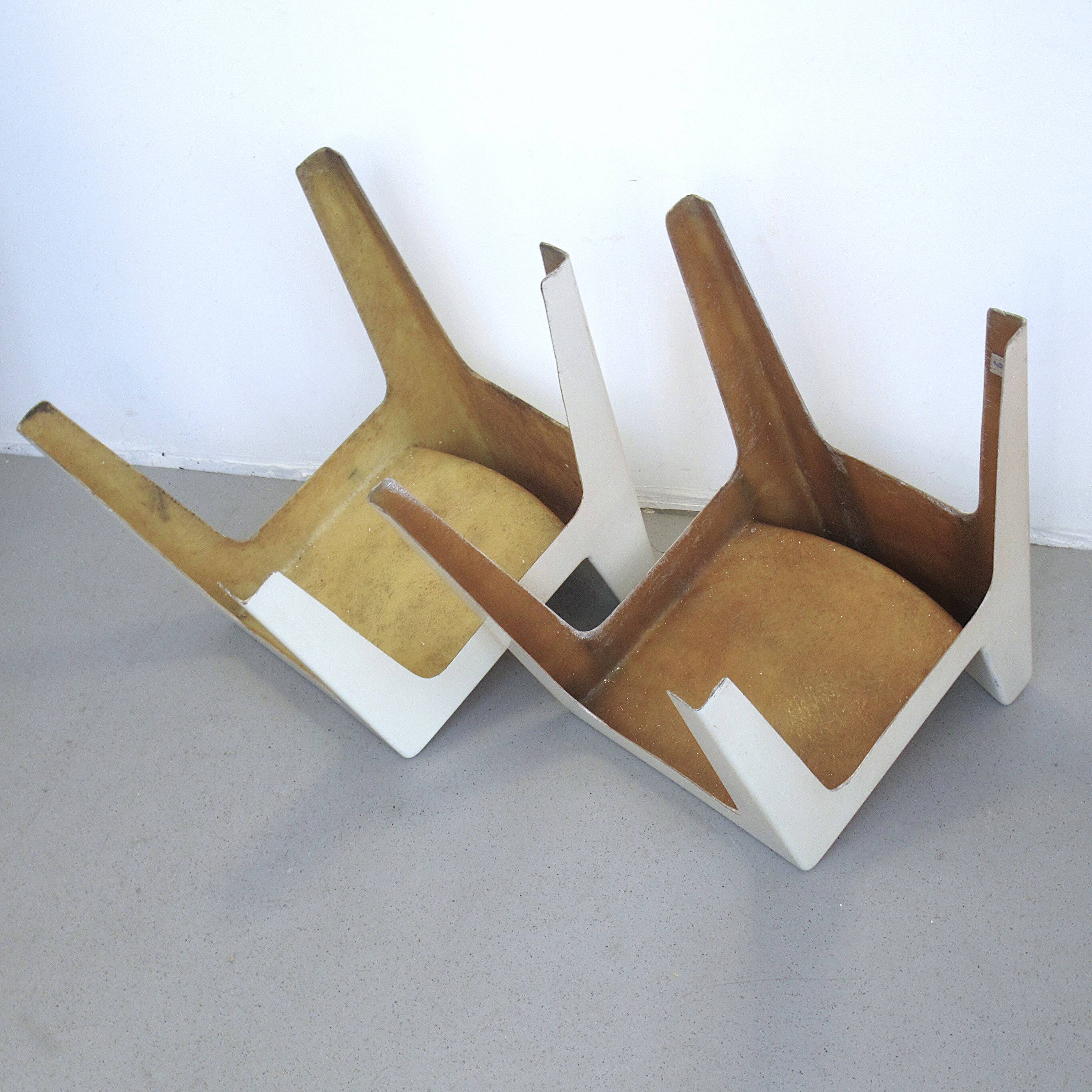 Two white fiberglass Kostka chairs 1970