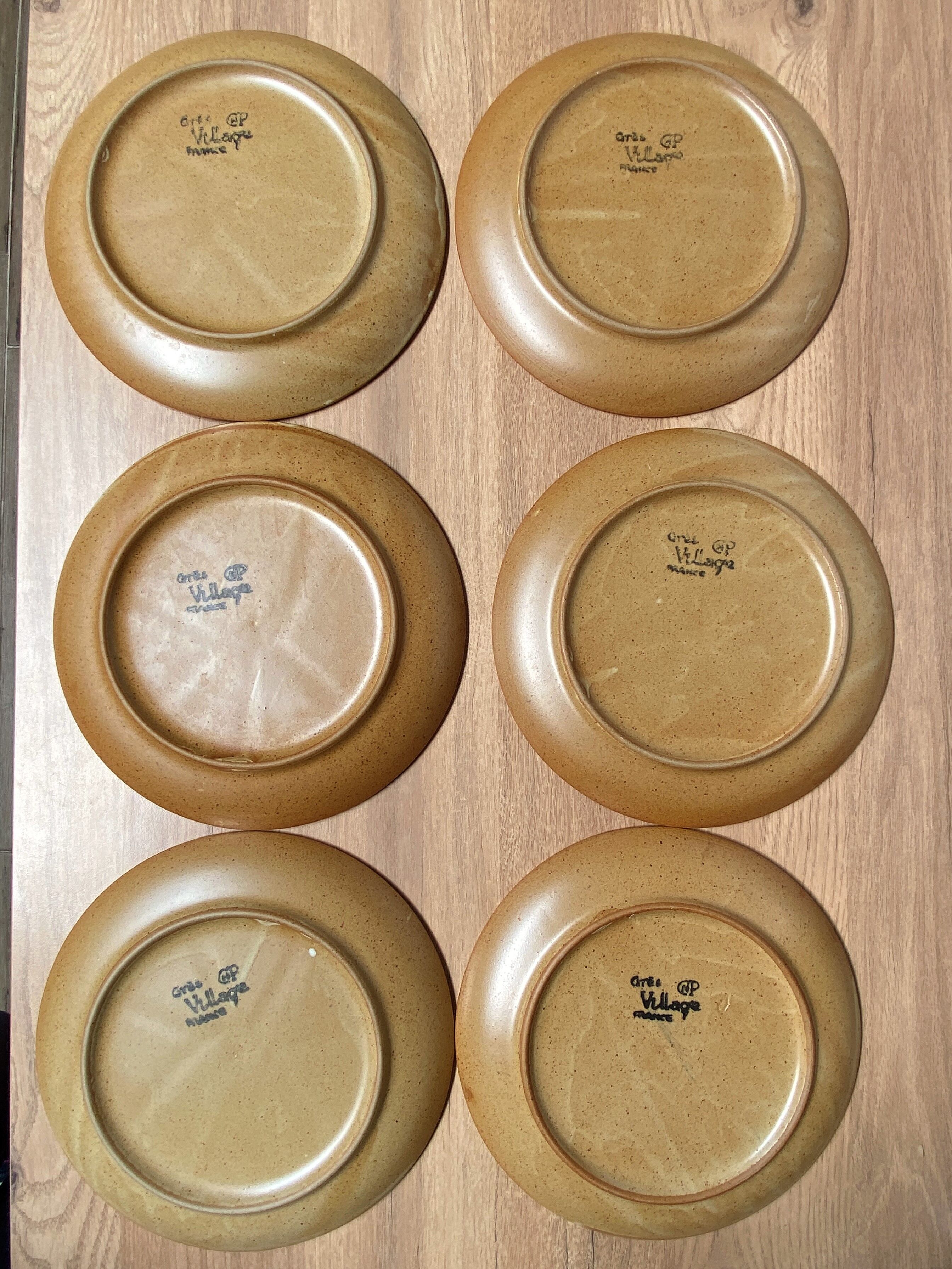 Set of 6 CNP Village stoneware fondue plates