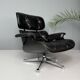 Chaise longue Eames entièrement noire par Herman Miller, années 1970.