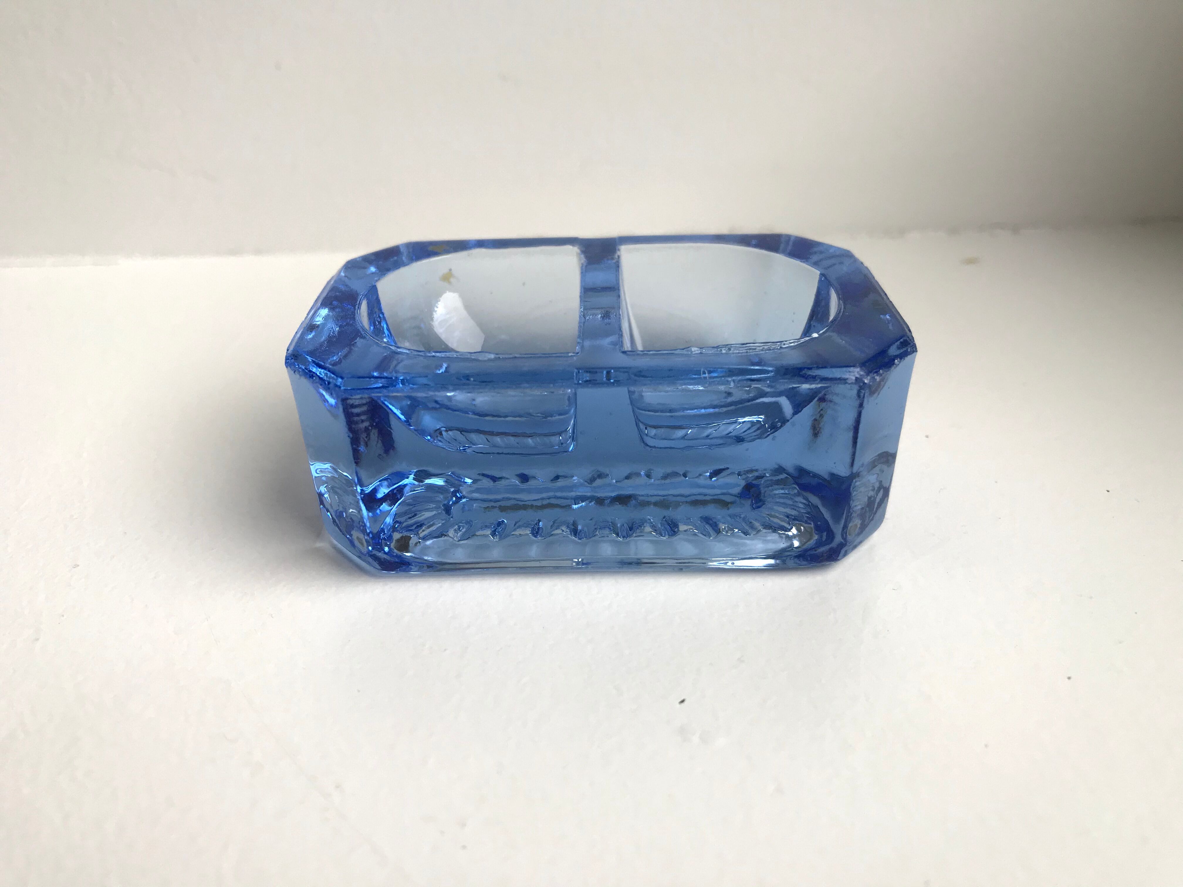 Salt shaker in electric blue molded glass