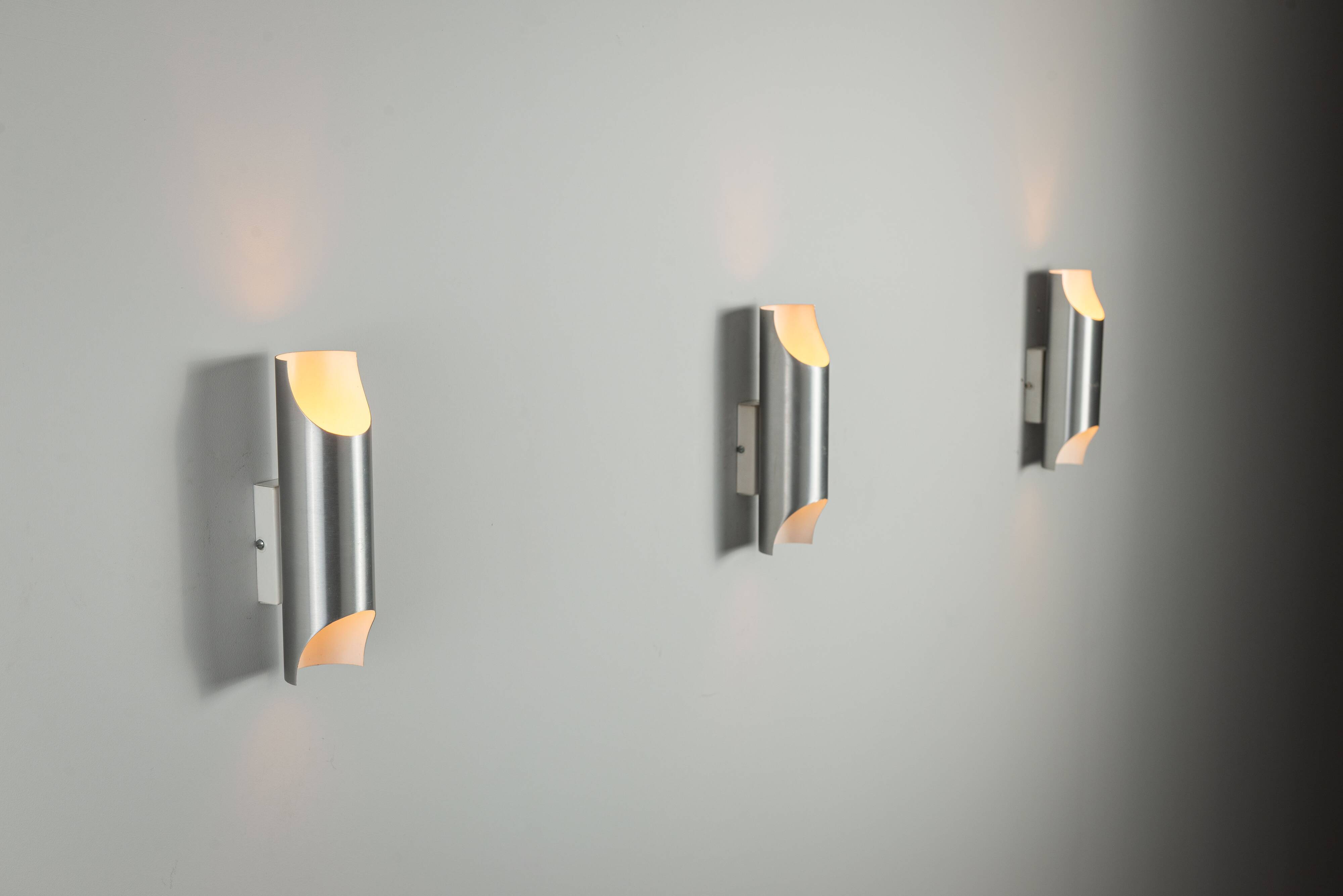 Set of three aluminium cylindrical wall lamps