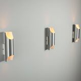 Set of three aluminium cylindrical wall lamps