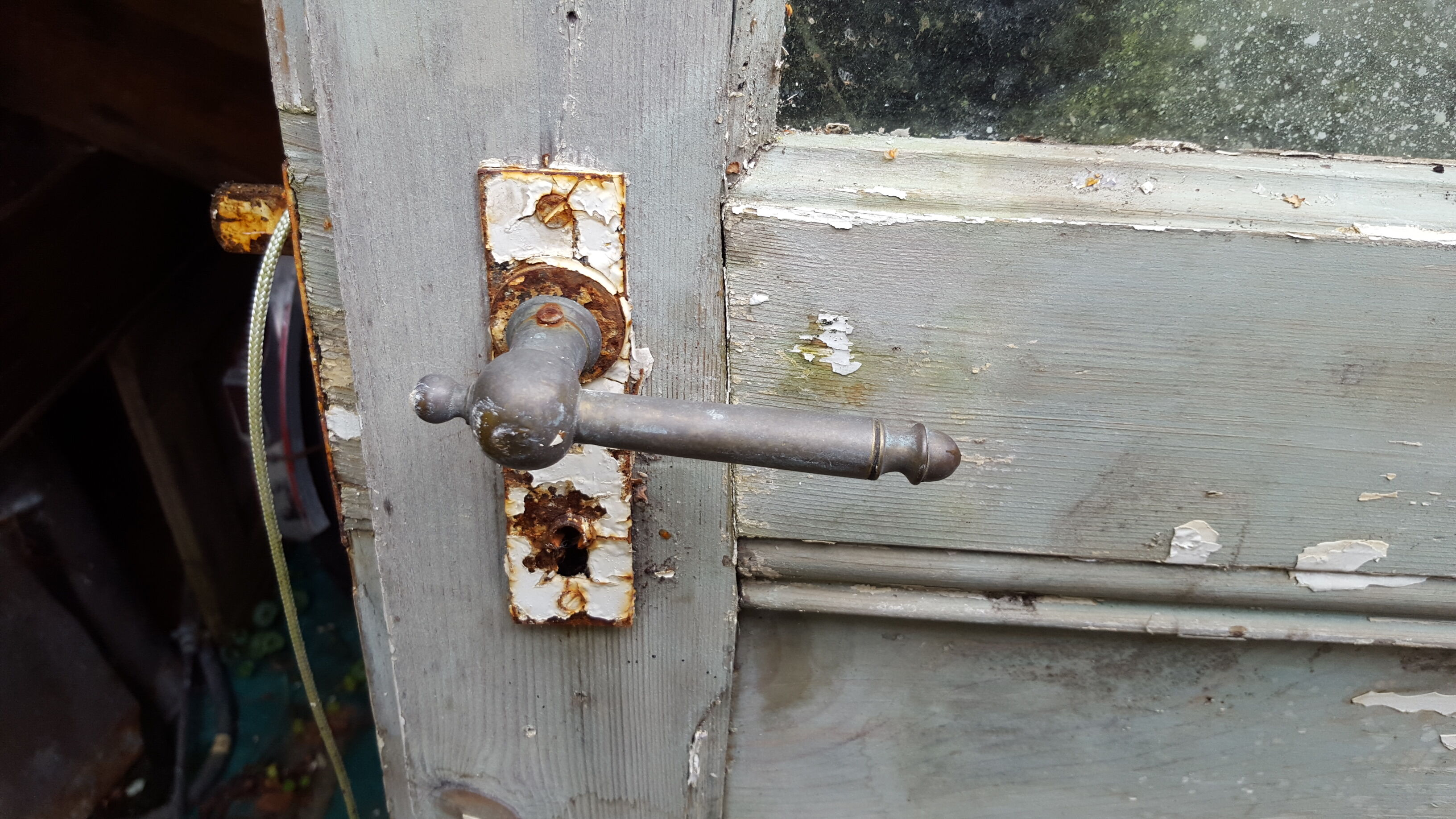 Old glass door beautiful patina. Height: 207.5 cm