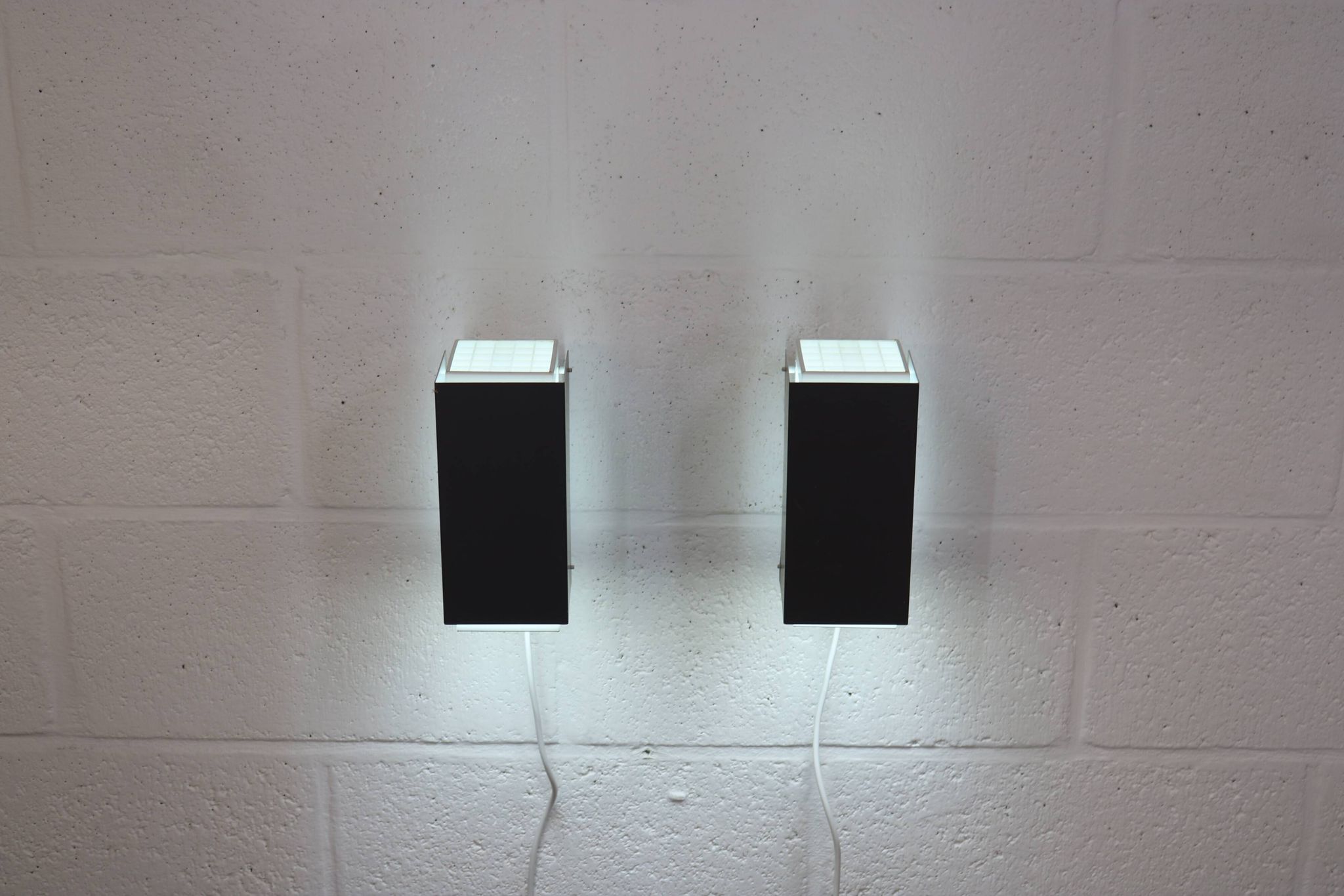 Pair of grey and white wall sconces by Preben Dahl for H. F. Belysning, 1960s