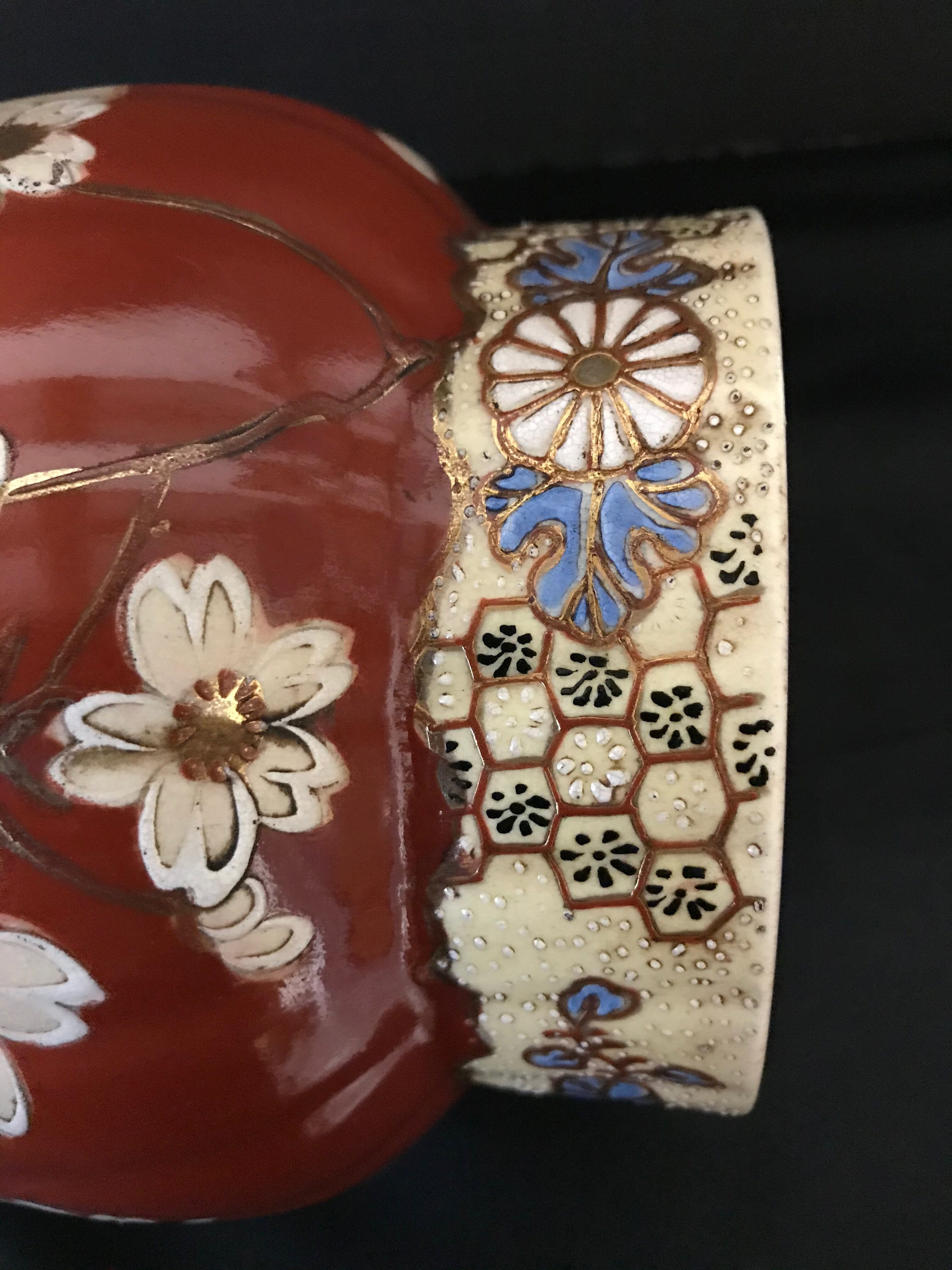 Vase - enamelled faïence with hand-painted gilding