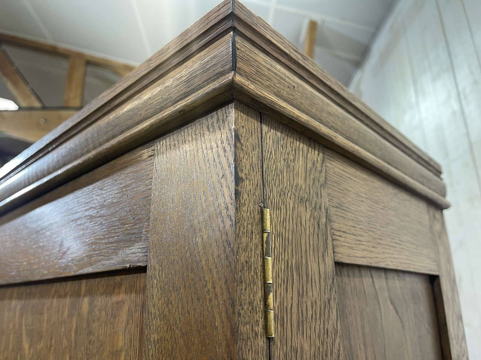 English oak wardrobe from the early 20th century.