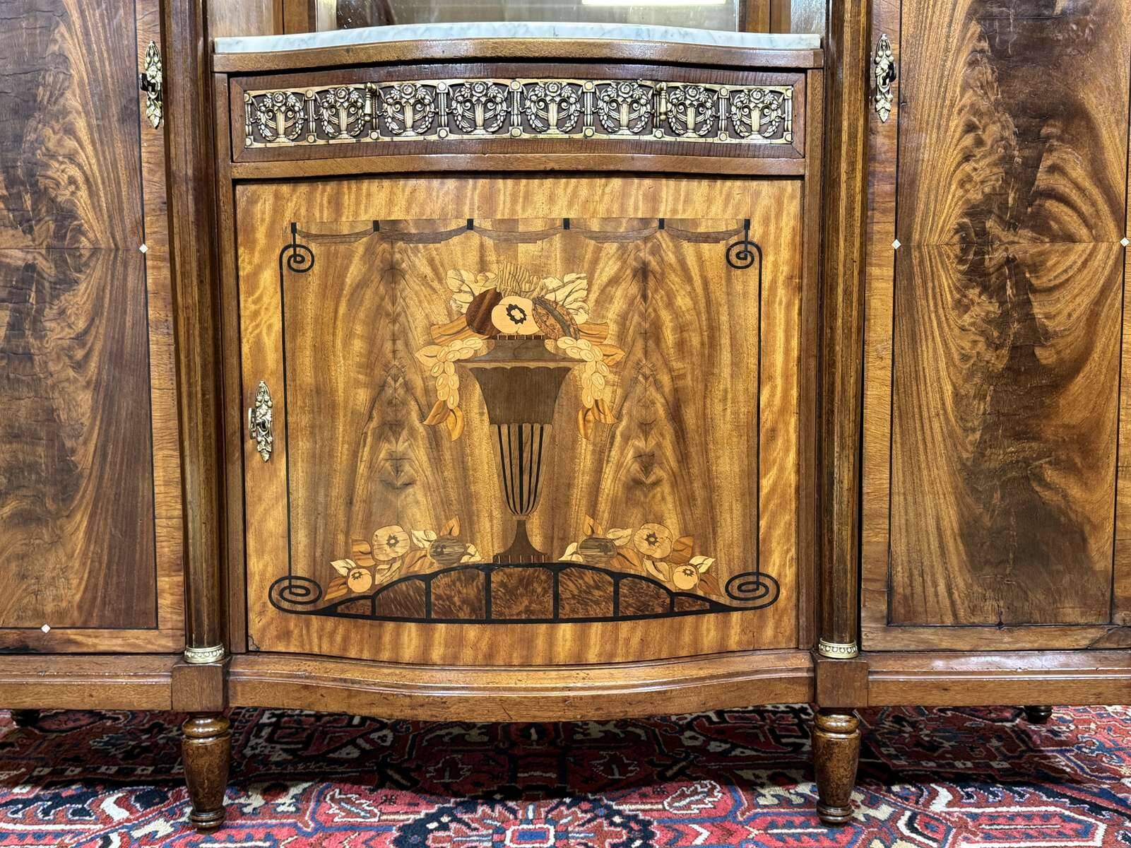 Art Deco buffet in mahogany, oak, and marble top.