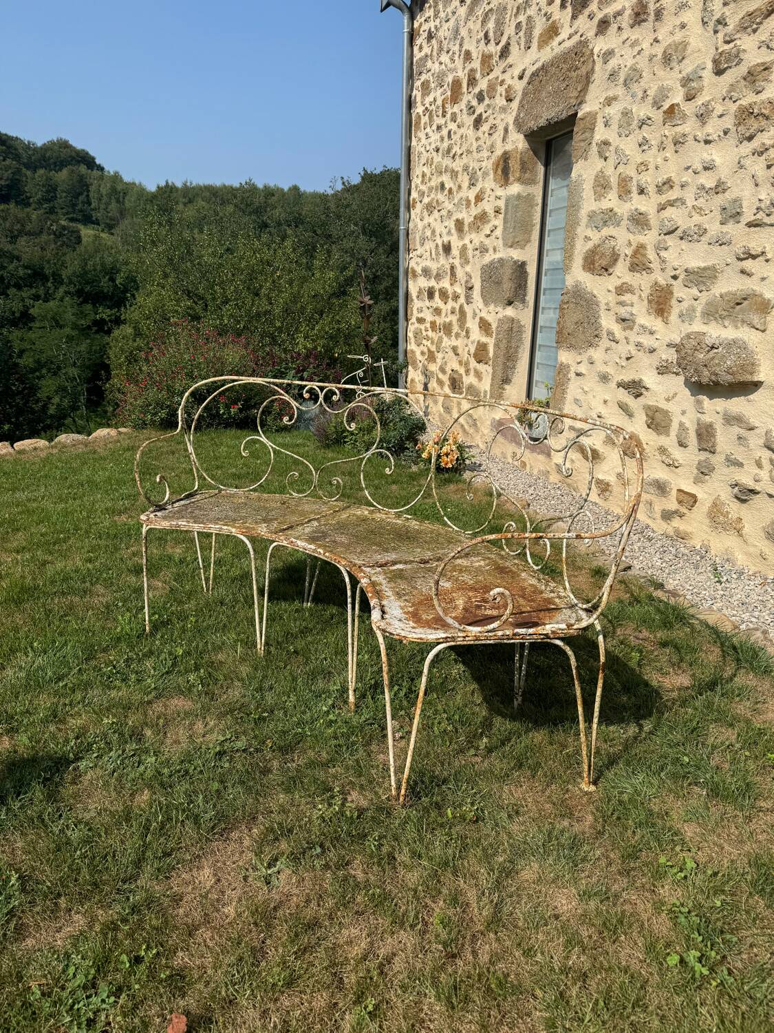 Wrought iron half-moon bench