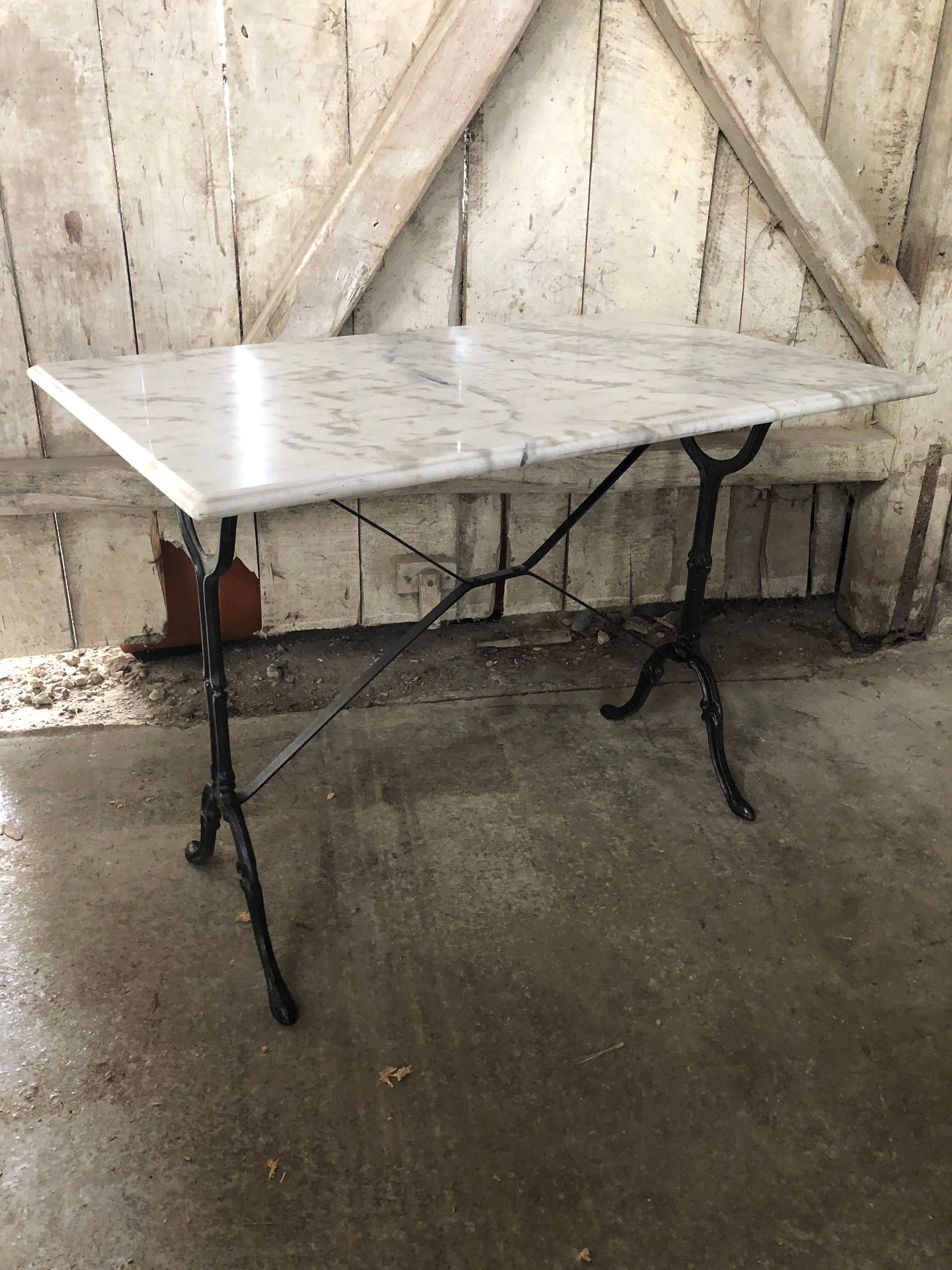 Old bistro table pied fer wrought black + white marble top vintage