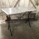 Old bistro table pied fer wrought black + white marble top vintage