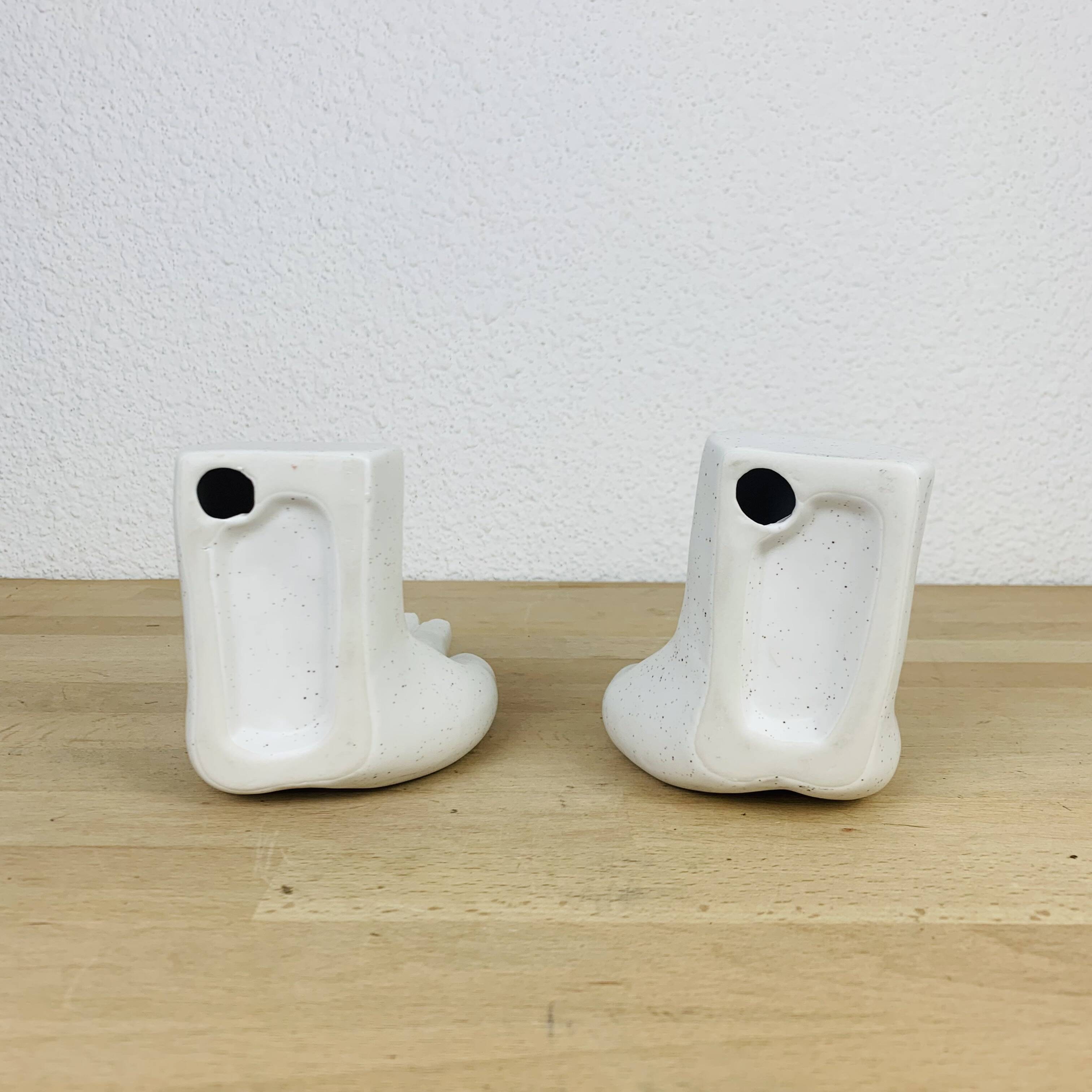 Pair of white ceramic hand bookends