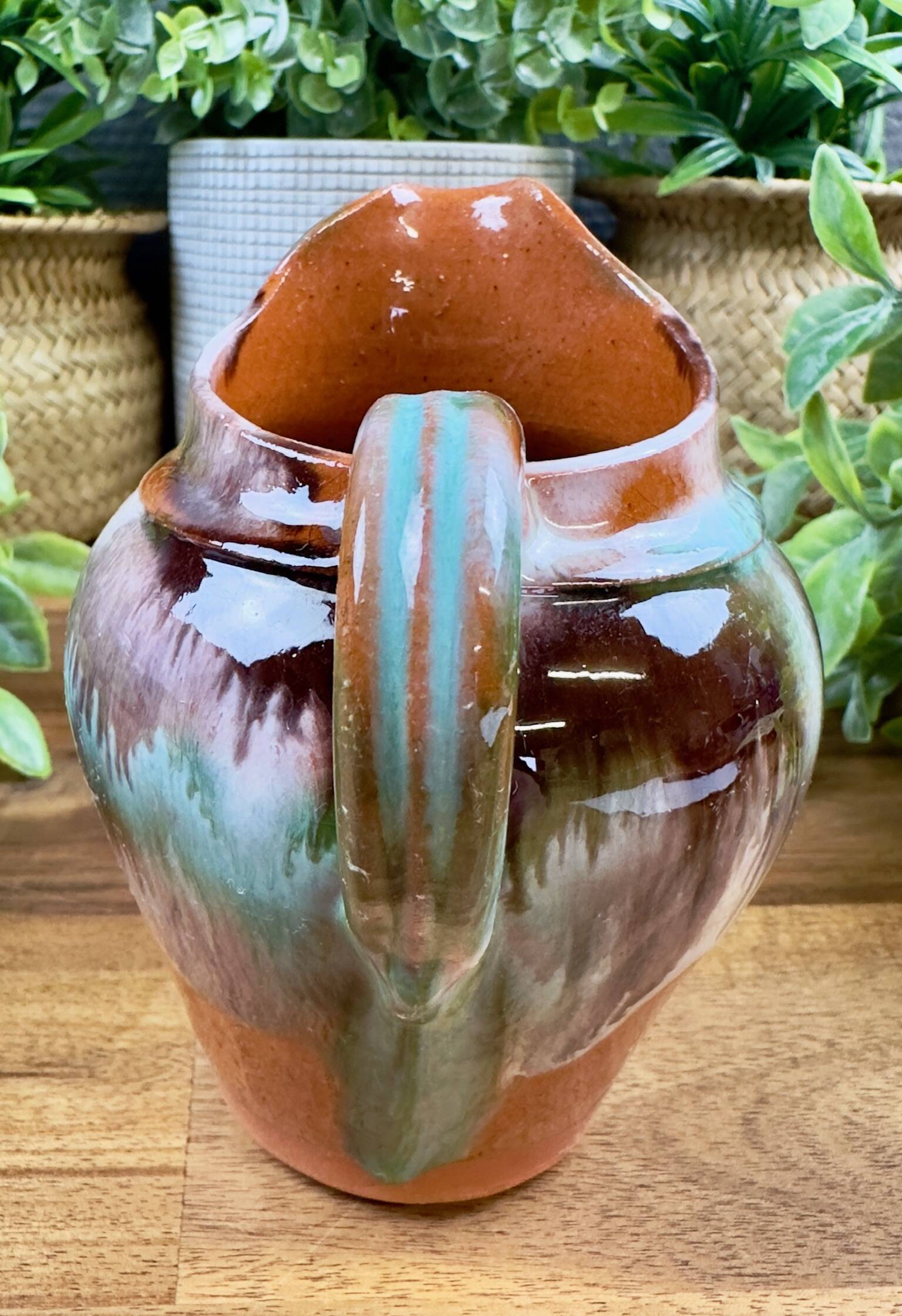 Old ceramic jug with glazed finish – flame decoration