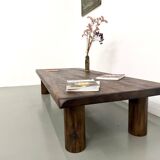 Modernist coffee table in solid elm, cylindrical pine base, 1970s.