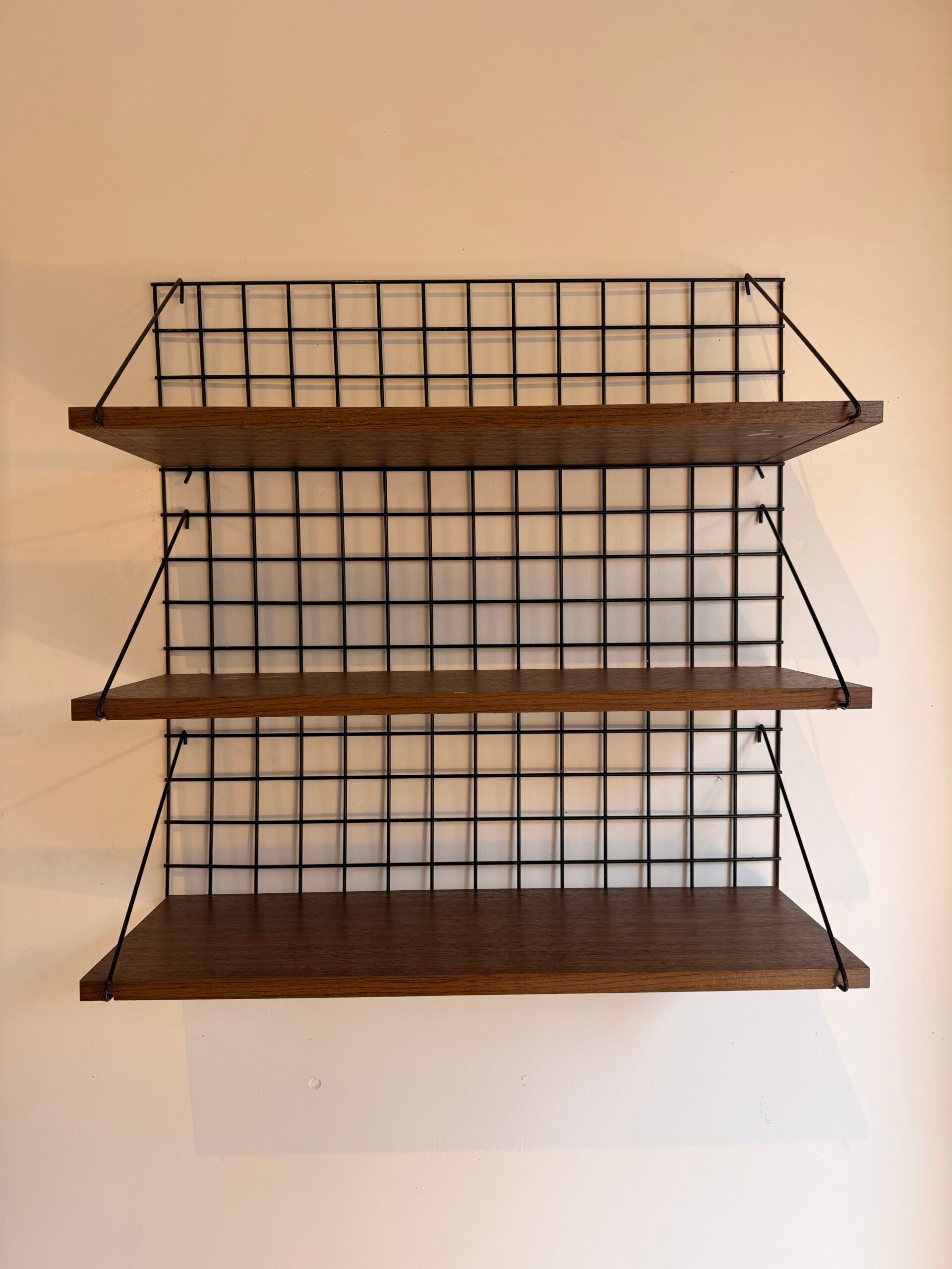 Vintage wall shelf from the 1970s.