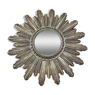 Witch's eye sun mirror in wood/resin.