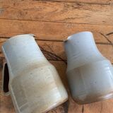 Pair vintage enamelled ceramic pitchers