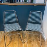 2 metal chairs with bungee cords